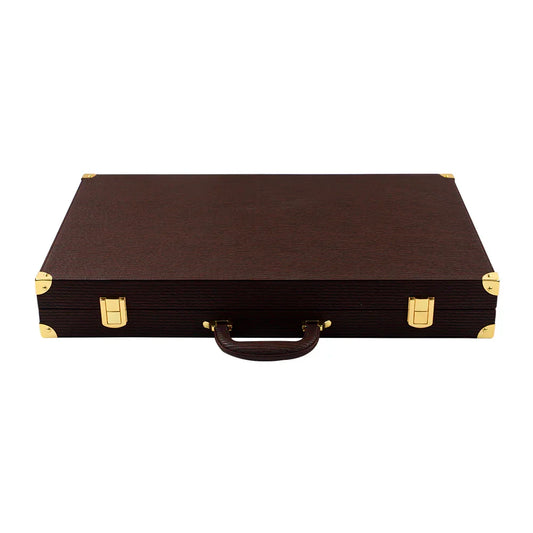 Closed dark brown vegan leather backgammon case with gold metal corners and latches, front handle