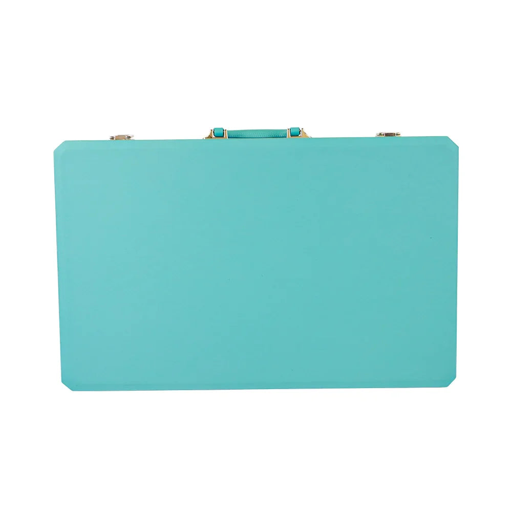Closed turquoise vegan leather backgammon set case with gold clasps and handle